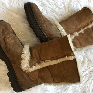 Visibly worn Ugg boots.